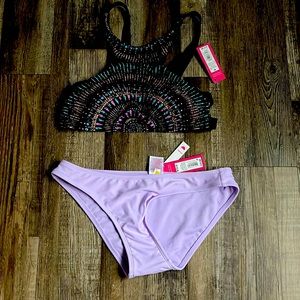 Brand new never worn bikini top and bottom. Both medium.
